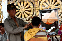16. Street Barber - Phnom Penh, Cambodia